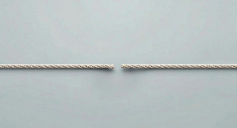 Corda se rompendo simbolizando fim de um relacionamento